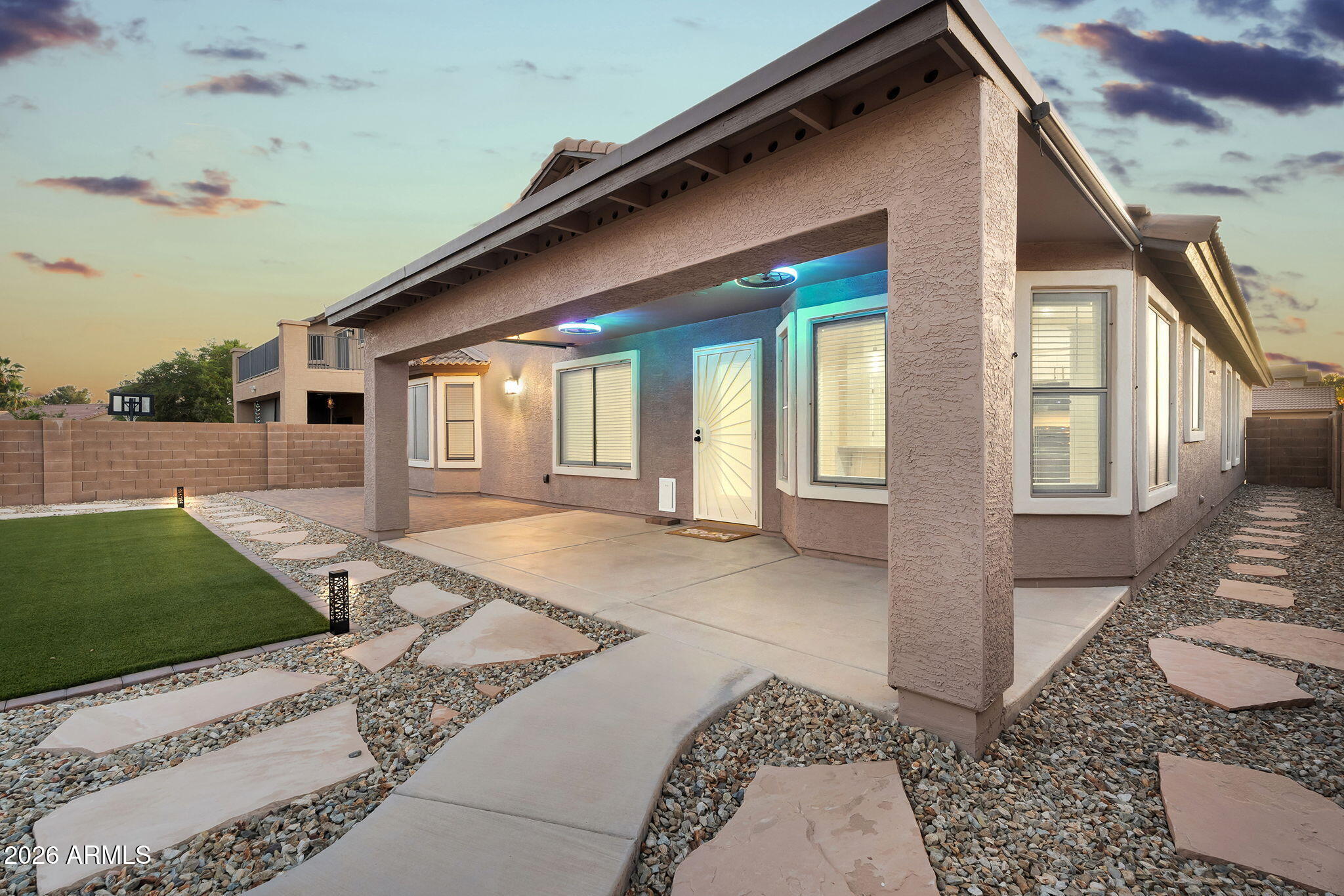 1815 South 174th Avenue Goodyear, AZ 85338 - Photo 26 of 57 a view of a house with a yard