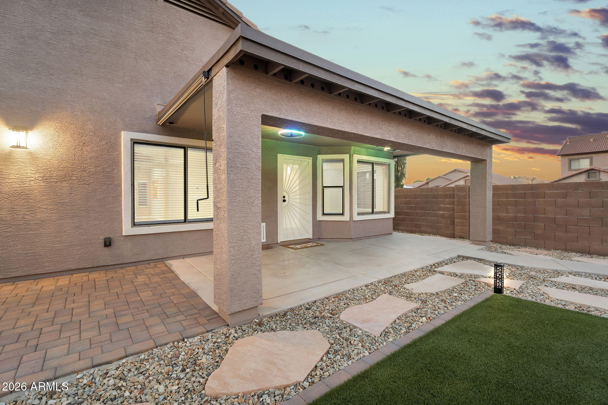 1815 South 174th Avenue Goodyear, AZ 85338 - Photo 29 of 57 a view of a house with backyard and porch
