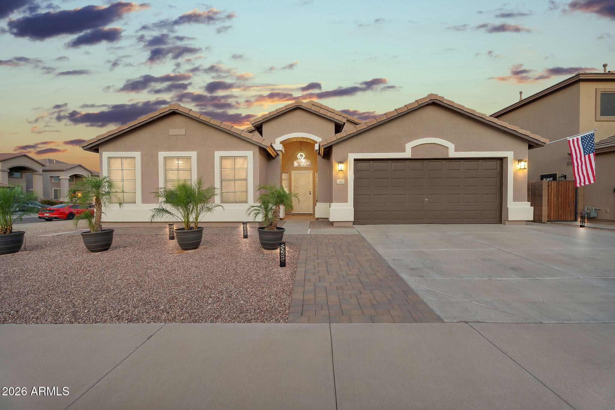 1815 South 174th Avenue Goodyear, AZ 85338 - Photo 55 of 57 a front view of a house with yard