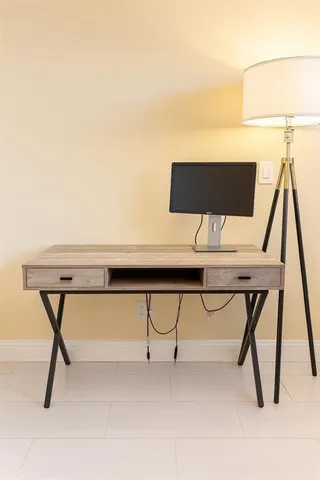 a view of entryway with a table and chair