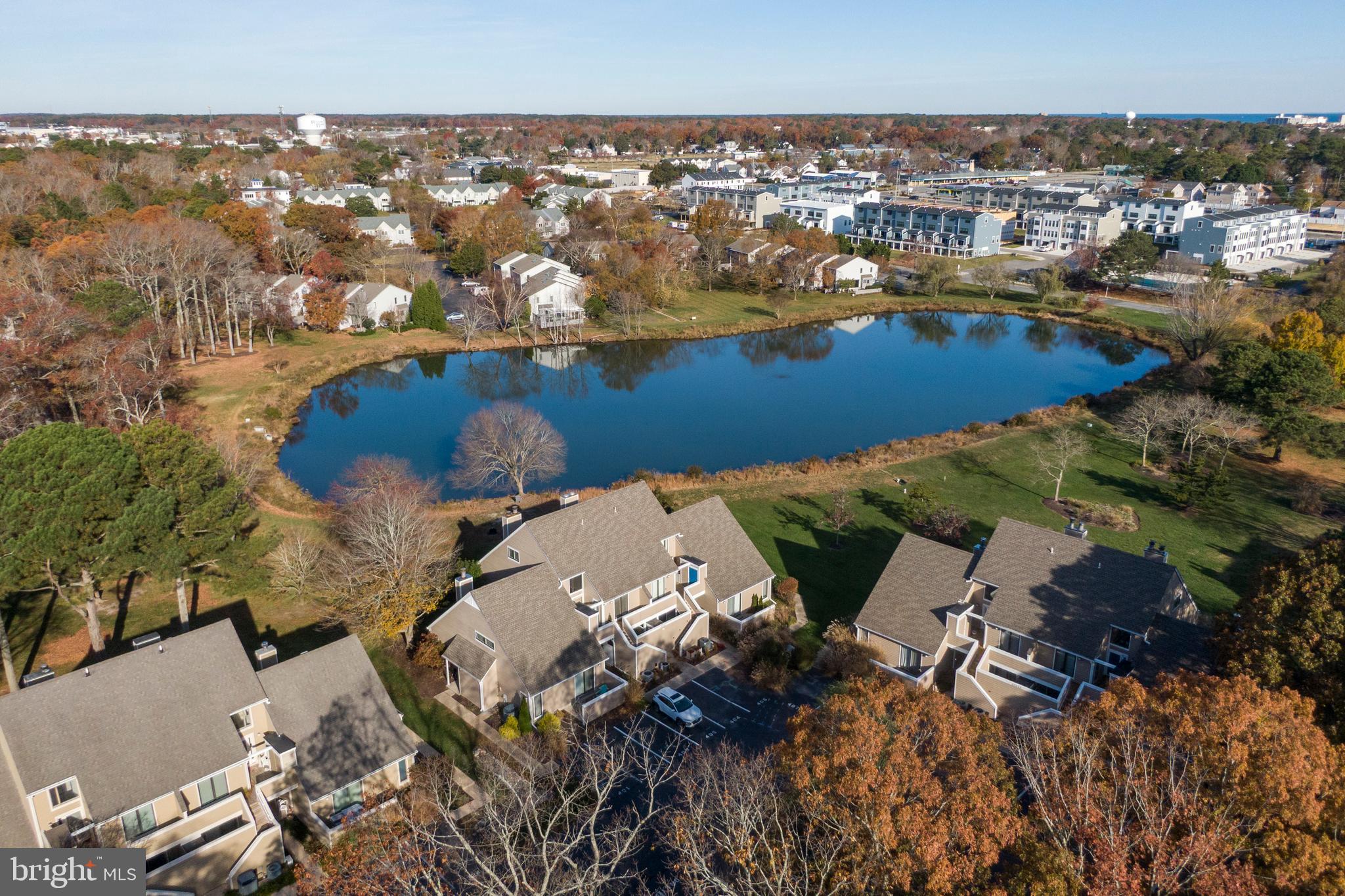 20852 Spring Lake Drive, Unit 405 Rehoboth Beach, DE 19971 - Photo 41 of 45 an aerial view of residential houses with outdoor space