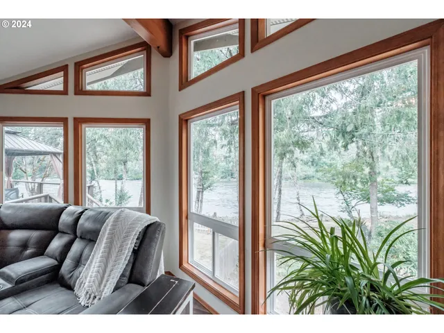 a living room with large windows