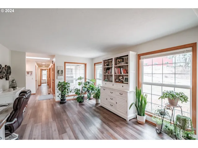 a room with furniture and a wooden floor
