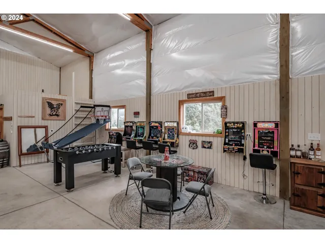 a bathroom with a sink a mirror and a shower