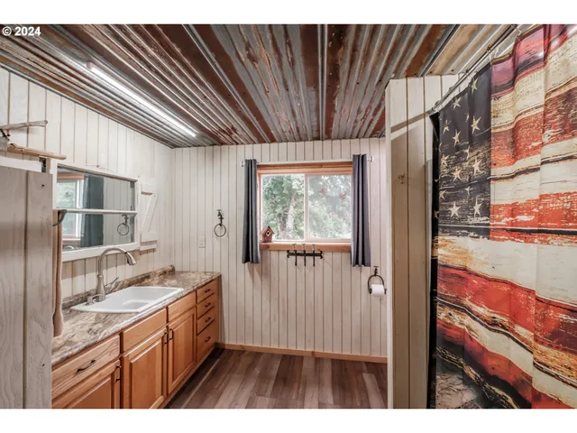 a backyard of a house with lots of green space