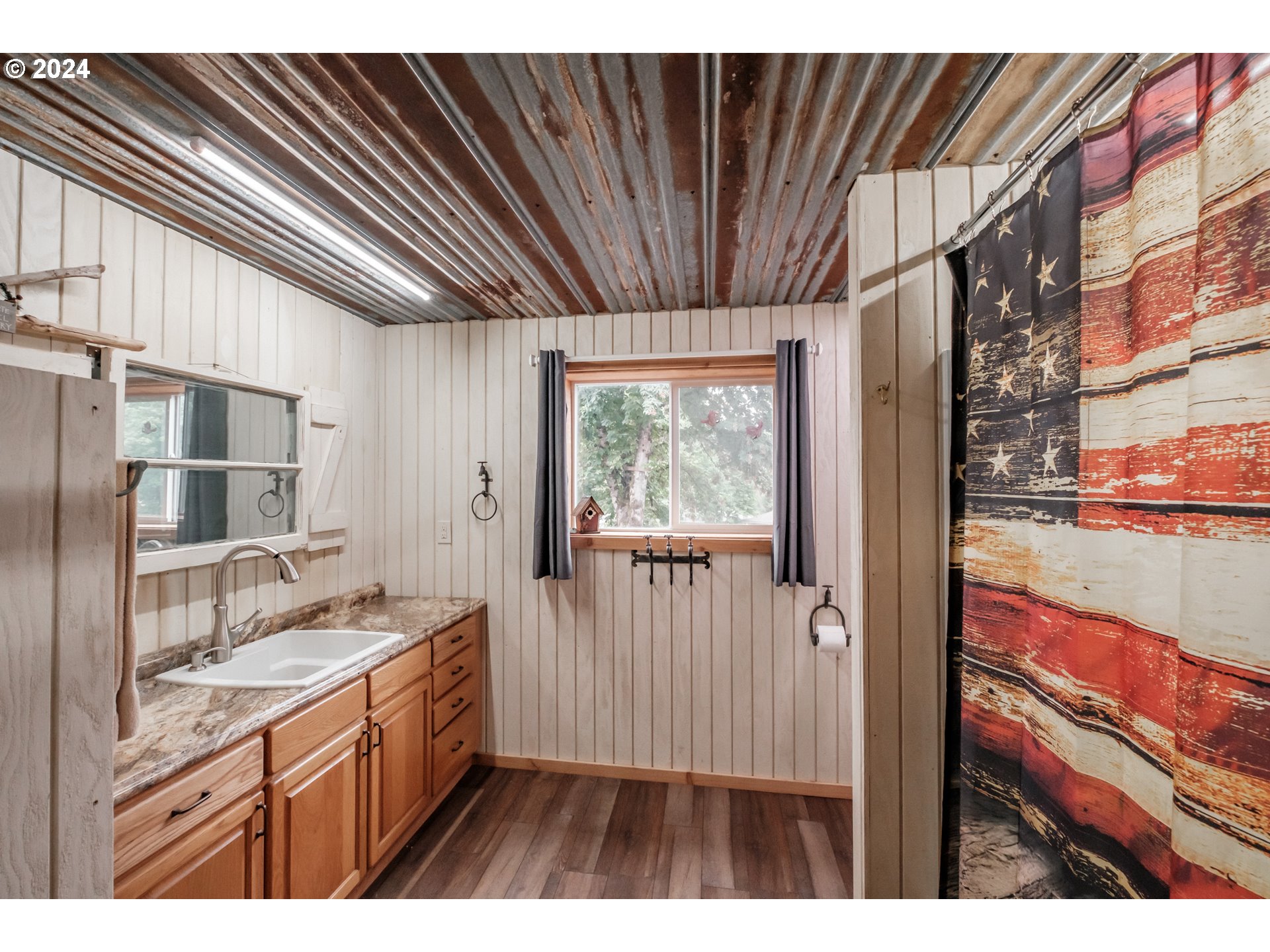 40166 Gates School Road Gates, OR 97346 - Photo 44 of 47 a bathroom with a sink a mirror and a shower