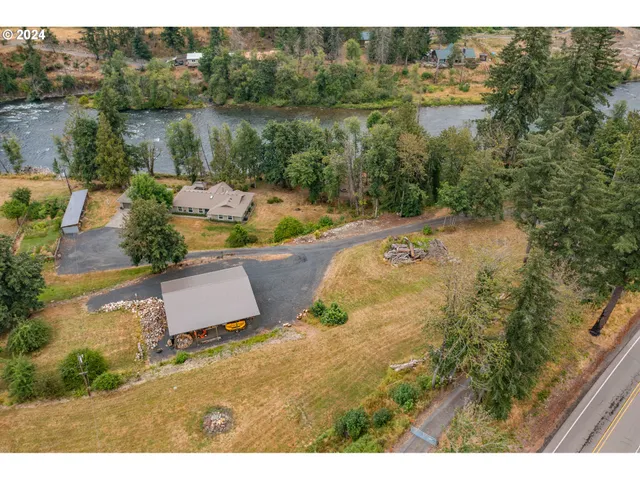 a view of a lake with a yard