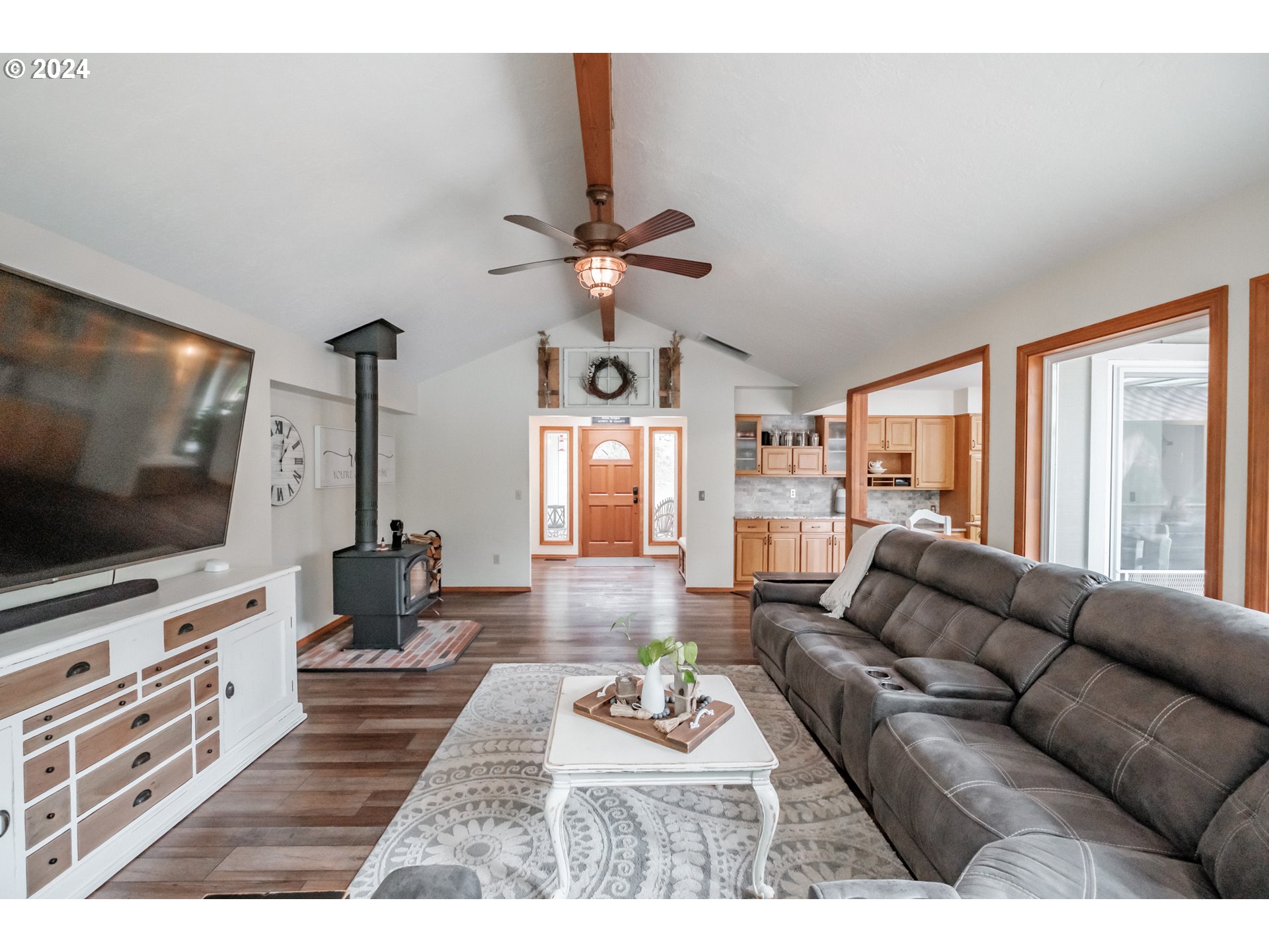 40166 Gates School Road Gates, OR 97346 - Photo 9 of 47 a living room with furniture and a flat screen tv