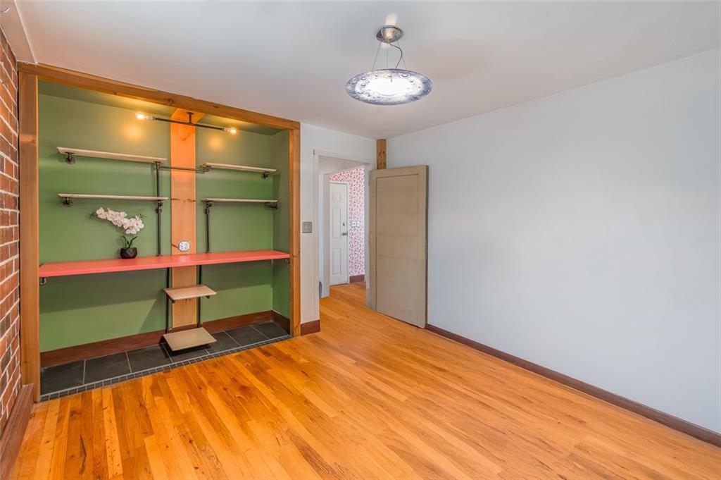 36 Daniel Street Southeast, Unit 5 Atlanta, GA 30312 - Photo 8 of 22 a bedroom with a bed and a window