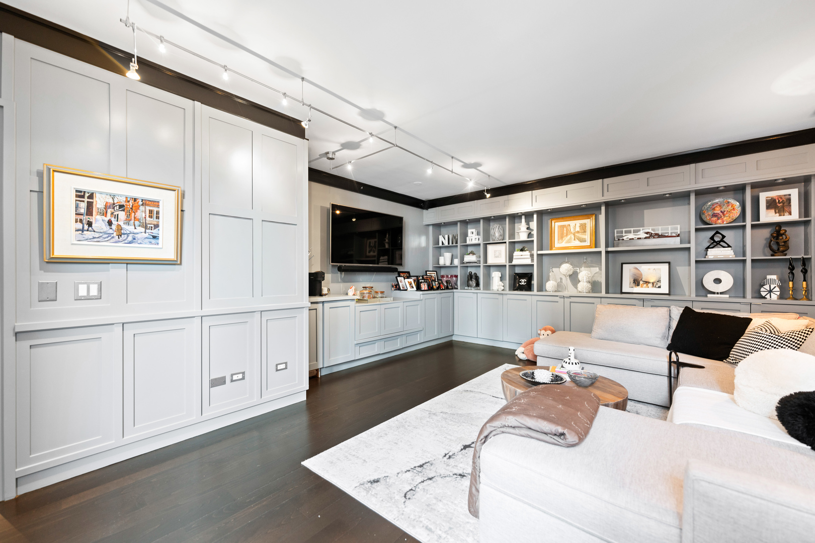 55 West Delaware Place, Unit 1011 Chicago, IL 60610 - Photo 36 of 50 a living room with furniture and a flat screen tv