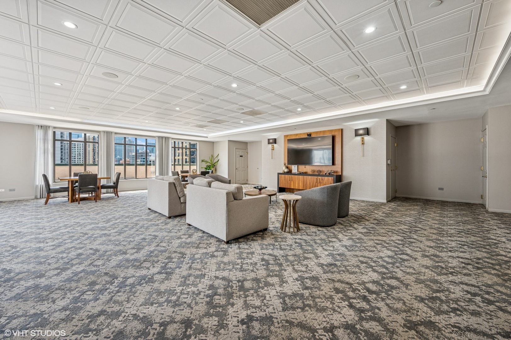 55 West Delaware Place, Unit 1011 Chicago, IL 60610 - Photo 48 of 50 a living room with furniture and a flat screen tv