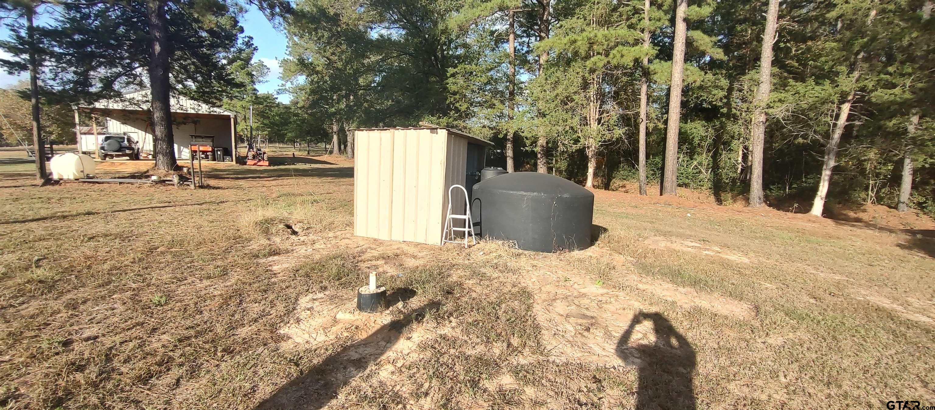 1271 County Road 3685 Joaquin, TX 75954 - Photo 27 of 46 a view of street with trees
