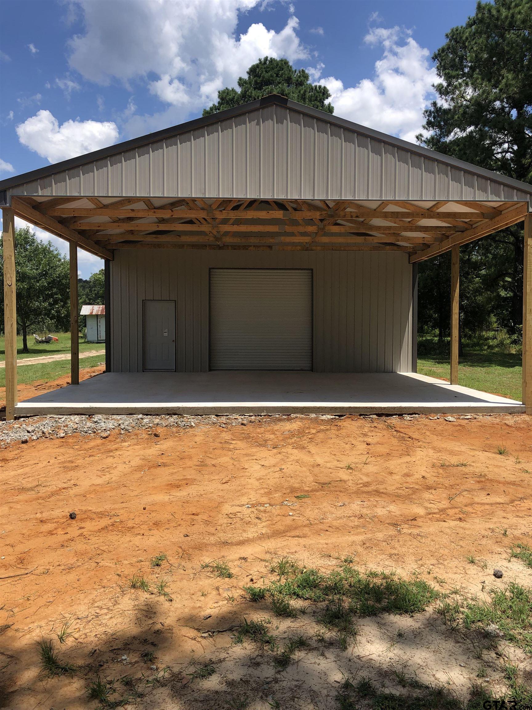 1271 County Road 3685 Joaquin, TX 75954 - Photo 30 of 46 a view of a house
