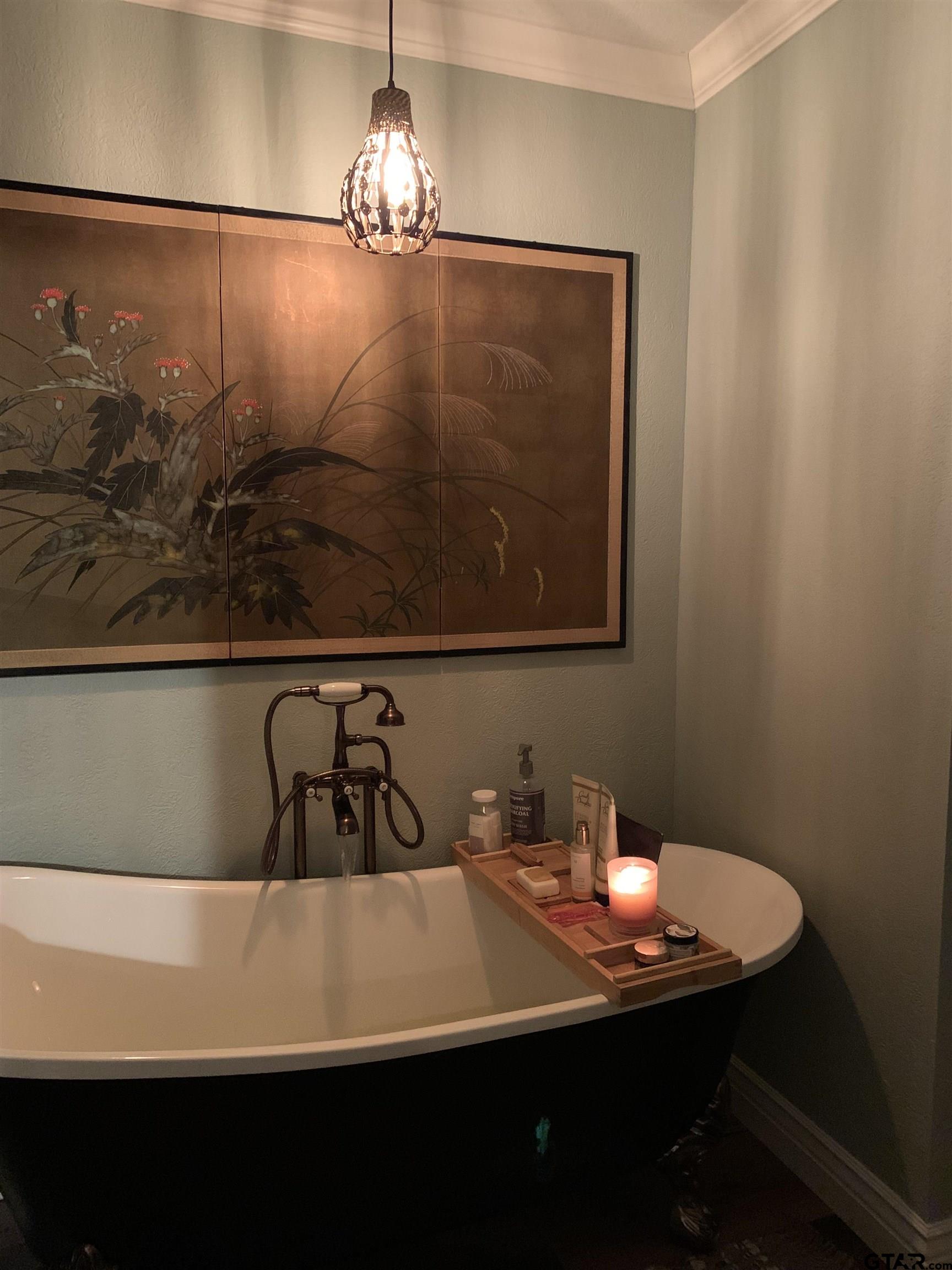1271 County Road 3685 Joaquin, TX 75954 - Photo 33 of 46 a bathroom with a sink and a mirror