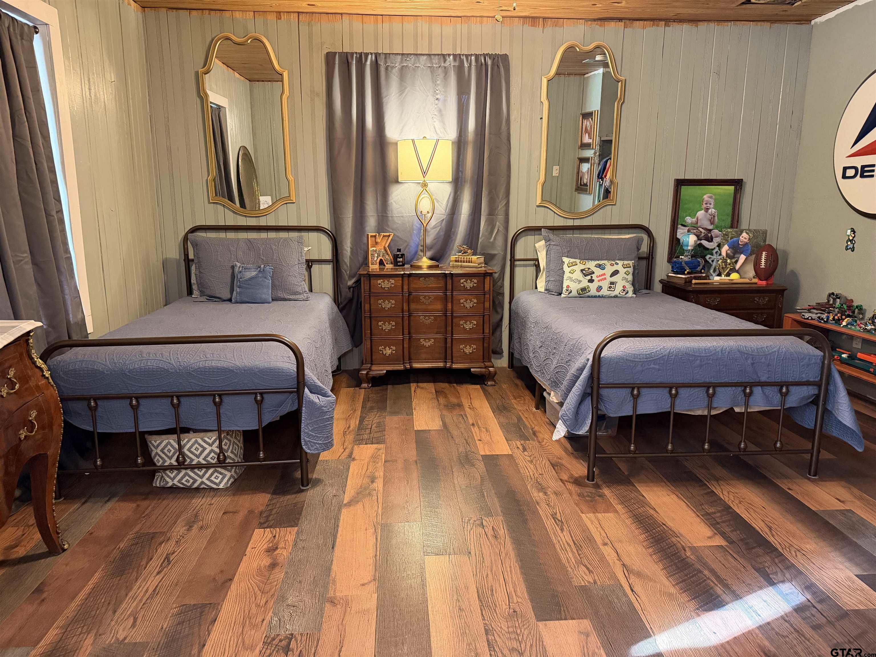 1271 County Road 3685 Joaquin, TX 75954 - Photo 38 of 46 a bedroom with a bed and wooden floor