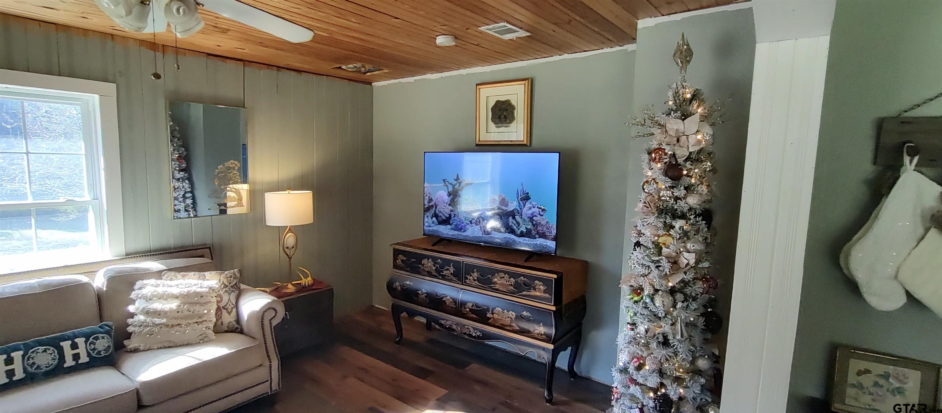 1271 County Road 3685 Joaquin, TX 75954 - Photo 42 of 46 a living room with furniture and a window