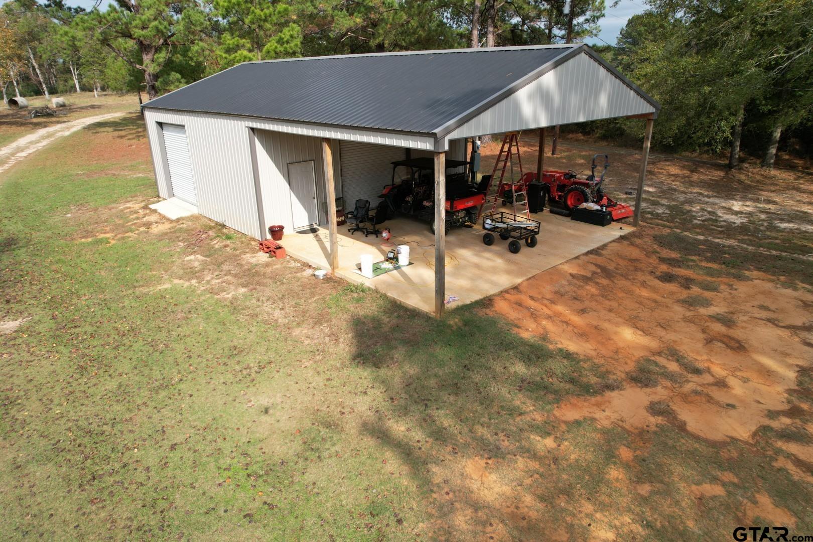 1271 County Road 3685 Joaquin, TX 75954 - Photo 5 of 46 a view of outdoor space and deck