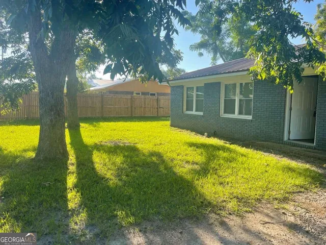 a view of a house with swimming pool