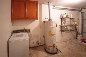 a view of a room with a window and a ceiling fan