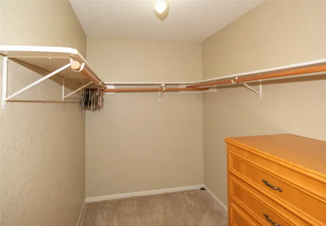 a bathroom with a sink vanity and a mirror