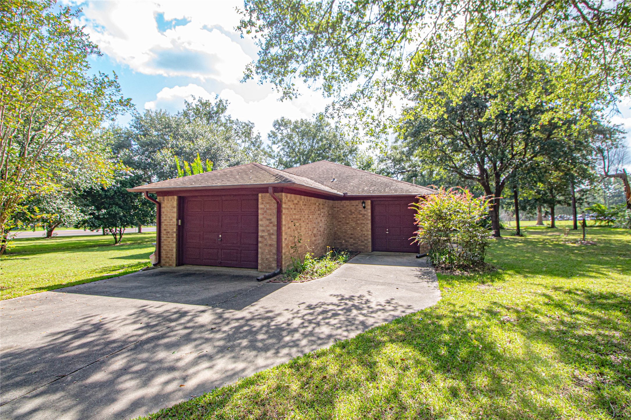 10500 Highway 150 Shepherd, TX 77371 - Photo 5 of 42 a front view of a house with a yard and garage