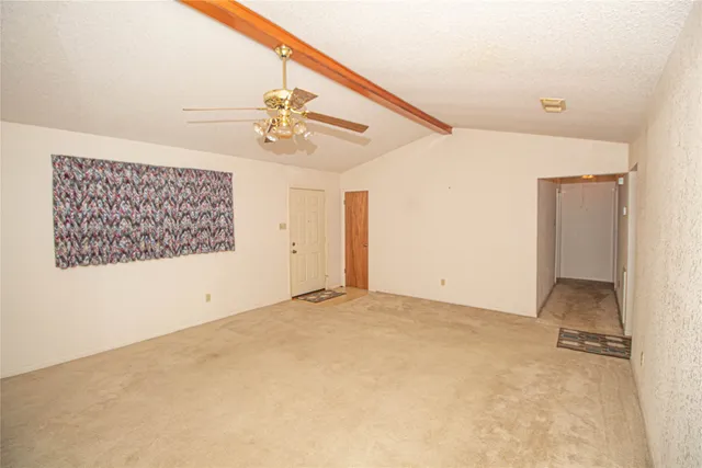 a kitchen with stainless steel appliances a sink and a refrigerator