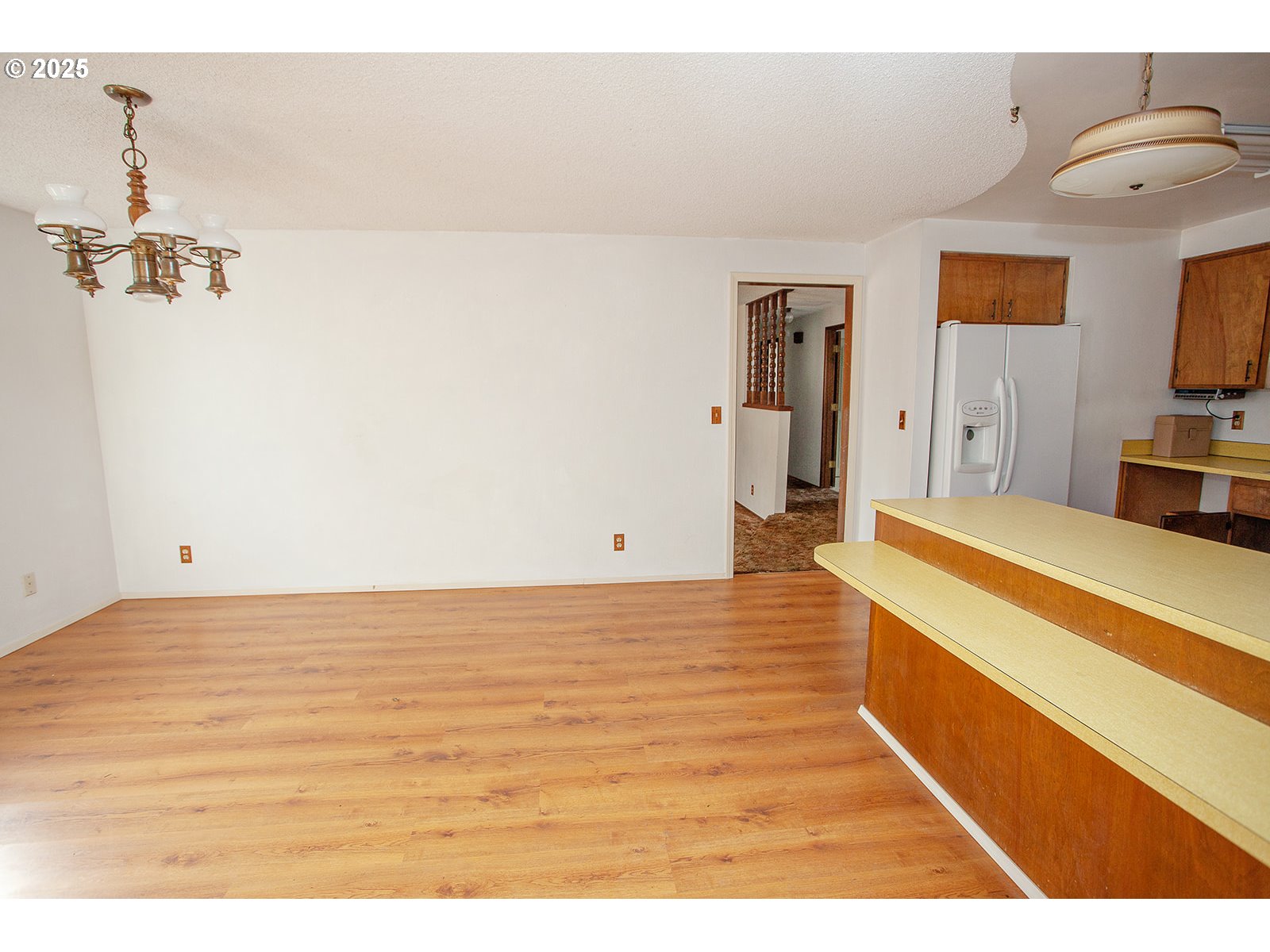 677 Laksonen Loop Springfield, OR 97478 - Photo 11 of 22 a living room with a bed furniture and a flat screen tv