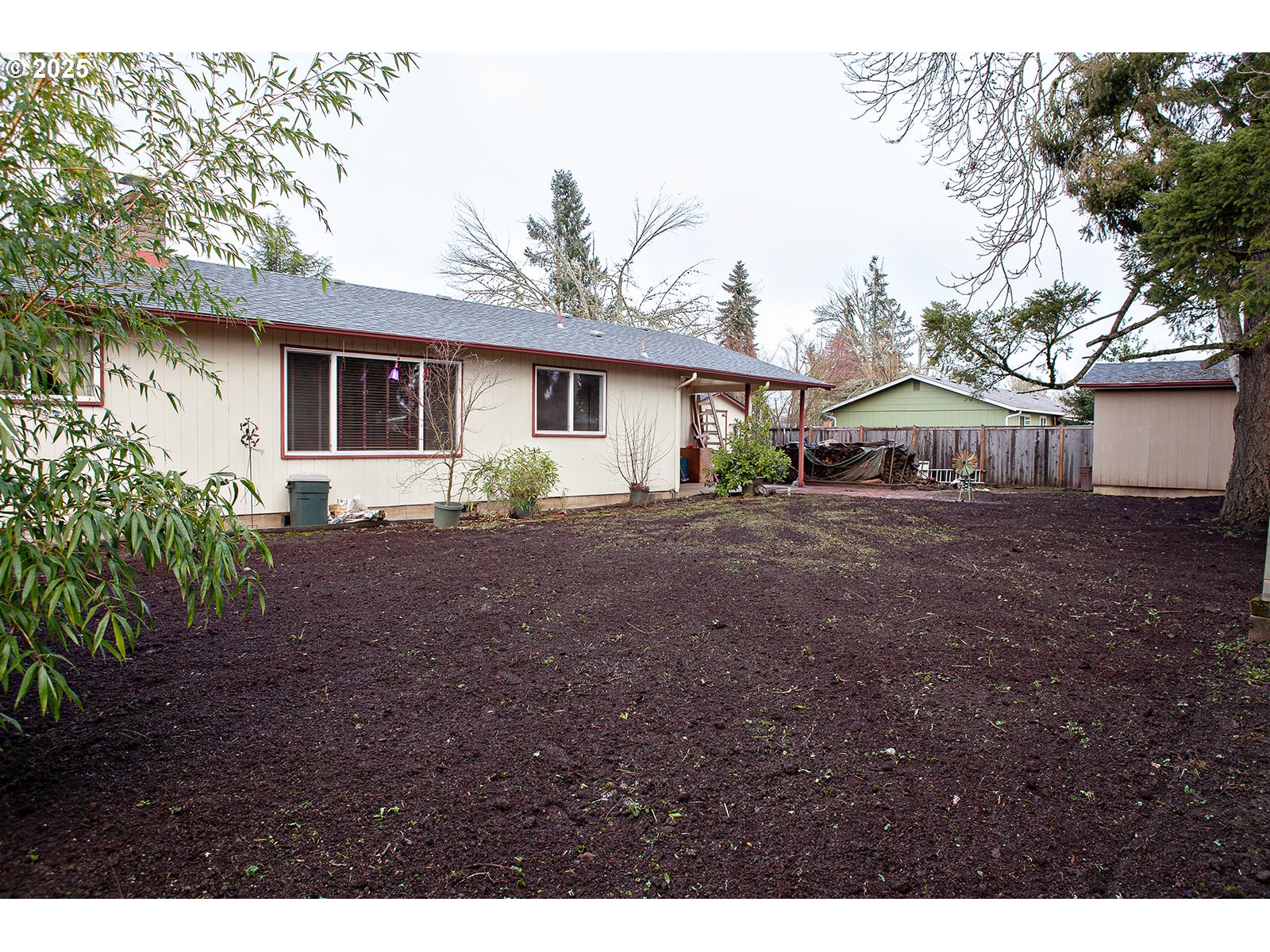 677 Laksonen Loop Springfield, OR 97478 - Photo 19 of 22 a view of a house with a backyard