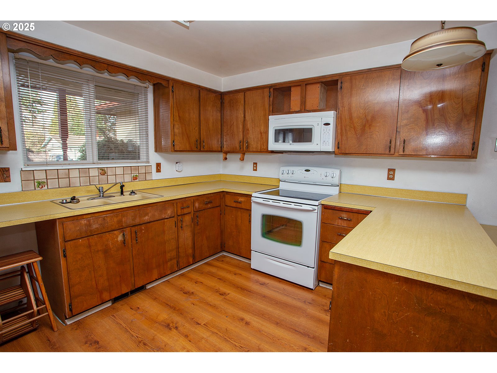 677 Laksonen Loop Springfield, OR 97478 - Photo 10 of 22 a kitchen with a sink cabinets and stainless steel appliances