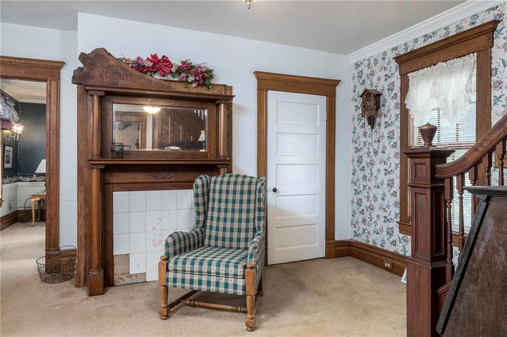 13 Penn Hill Road Prosperity, PA 15329 - Photo 12 of 30 a living room with furniture and a fireplace