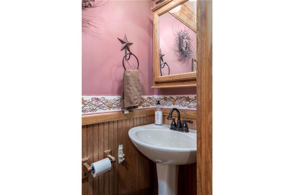 13 Penn Hill Road Prosperity, PA 15329 - Photo 15 of 30 a bathroom with a sink and a mirror