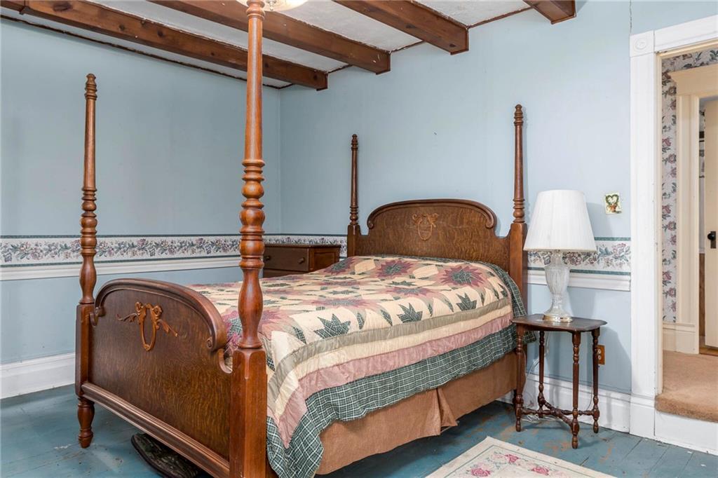 13 Penn Hill Road Prosperity, PA 15329 - Photo 22 of 30 a bedroom with bed and a night stand