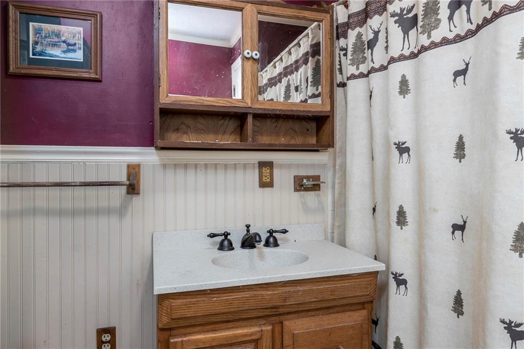 13 Penn Hill Road Prosperity, PA 15329 - Photo 23 of 30 a bathroom with a sink and a mirror