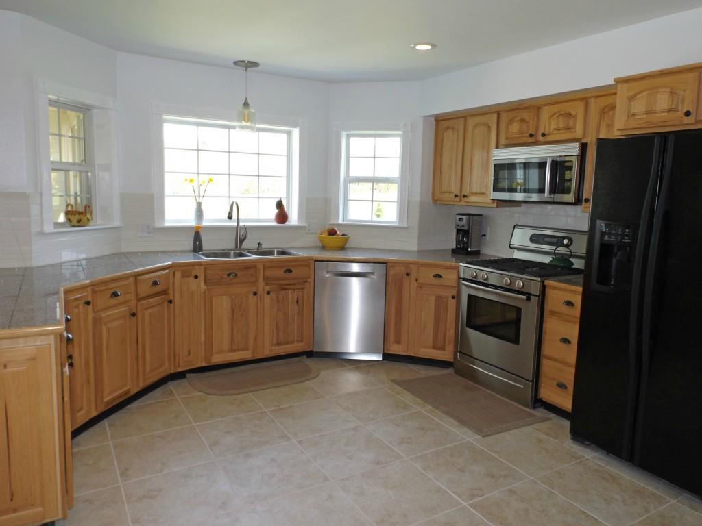 155 Canaan Road Hampden, ME 04444 - Photo 16 of 35 Kitchen has nice natural light with...