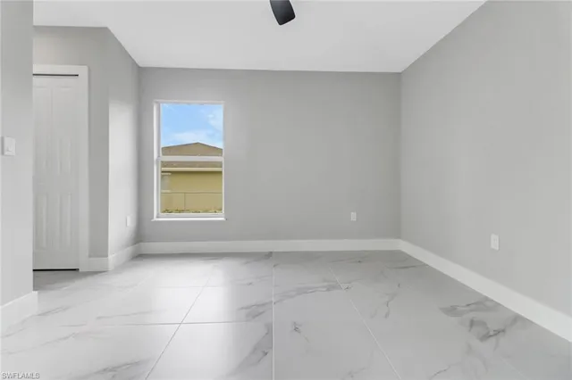 an empty room with windows