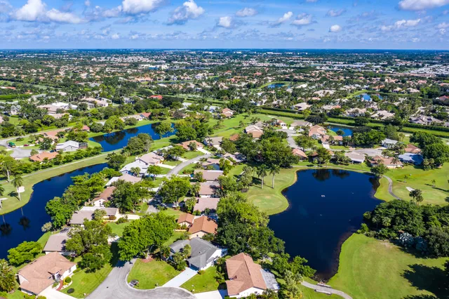 a view of a patio with a table chairs and a porch