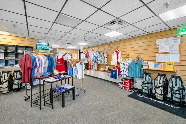 a view of road with palm trees