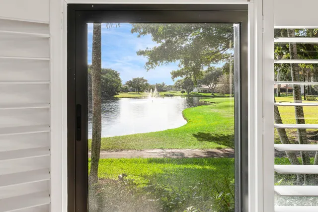 a view of a living room and entry way