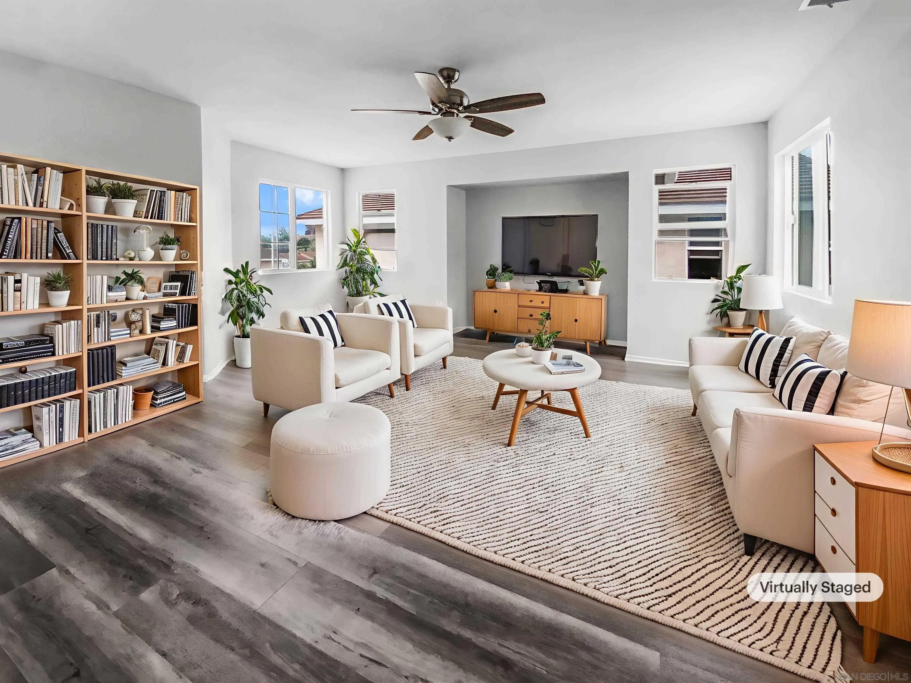 1822 McDougal Terrace El Cajon, CA 92021 - Photo 2 of 17 a living room with furniture and a rug