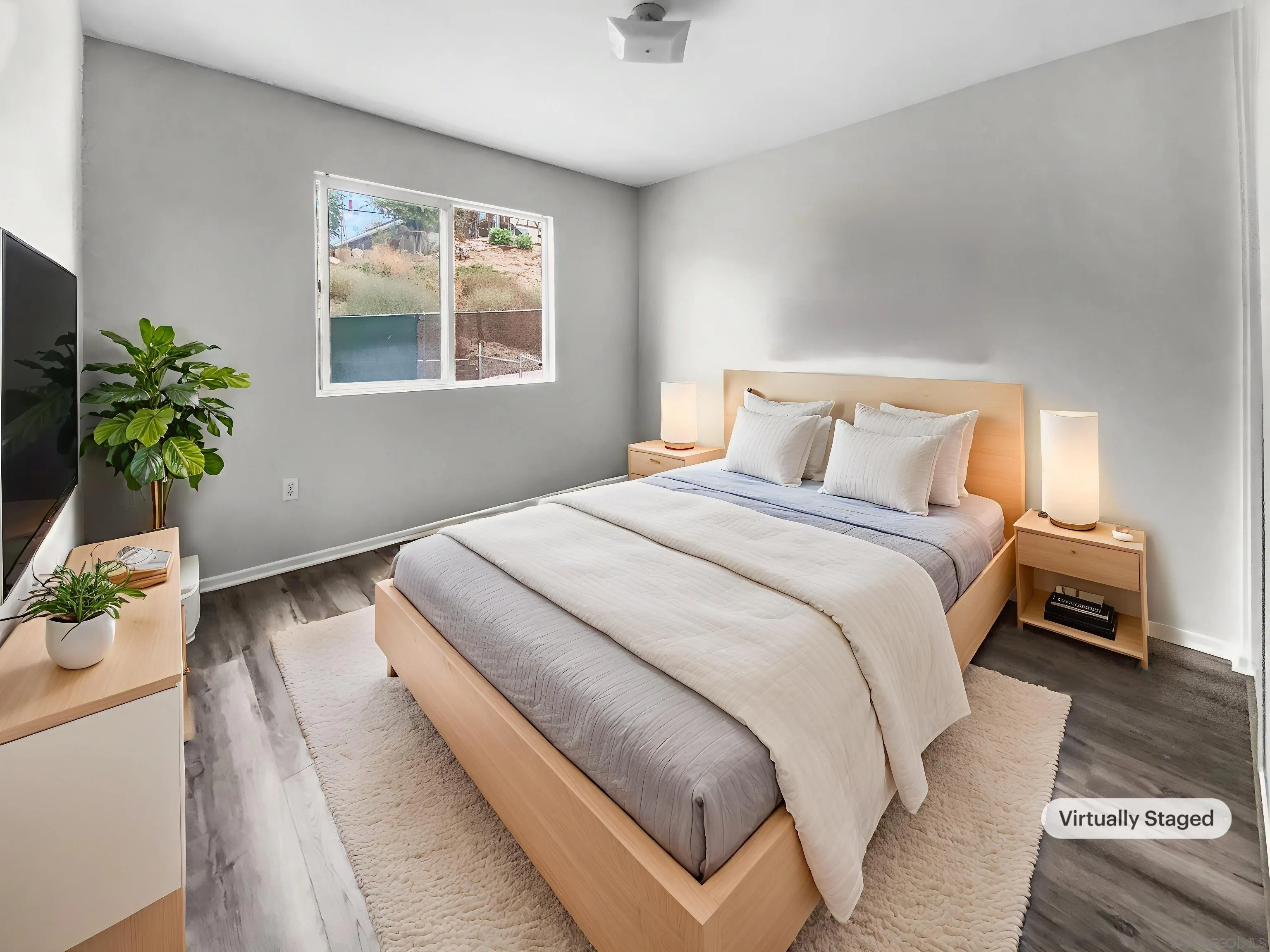 1822 McDougal Terrace El Cajon, CA 92021 - Photo 4 of 17 a bedroom with bed and a window