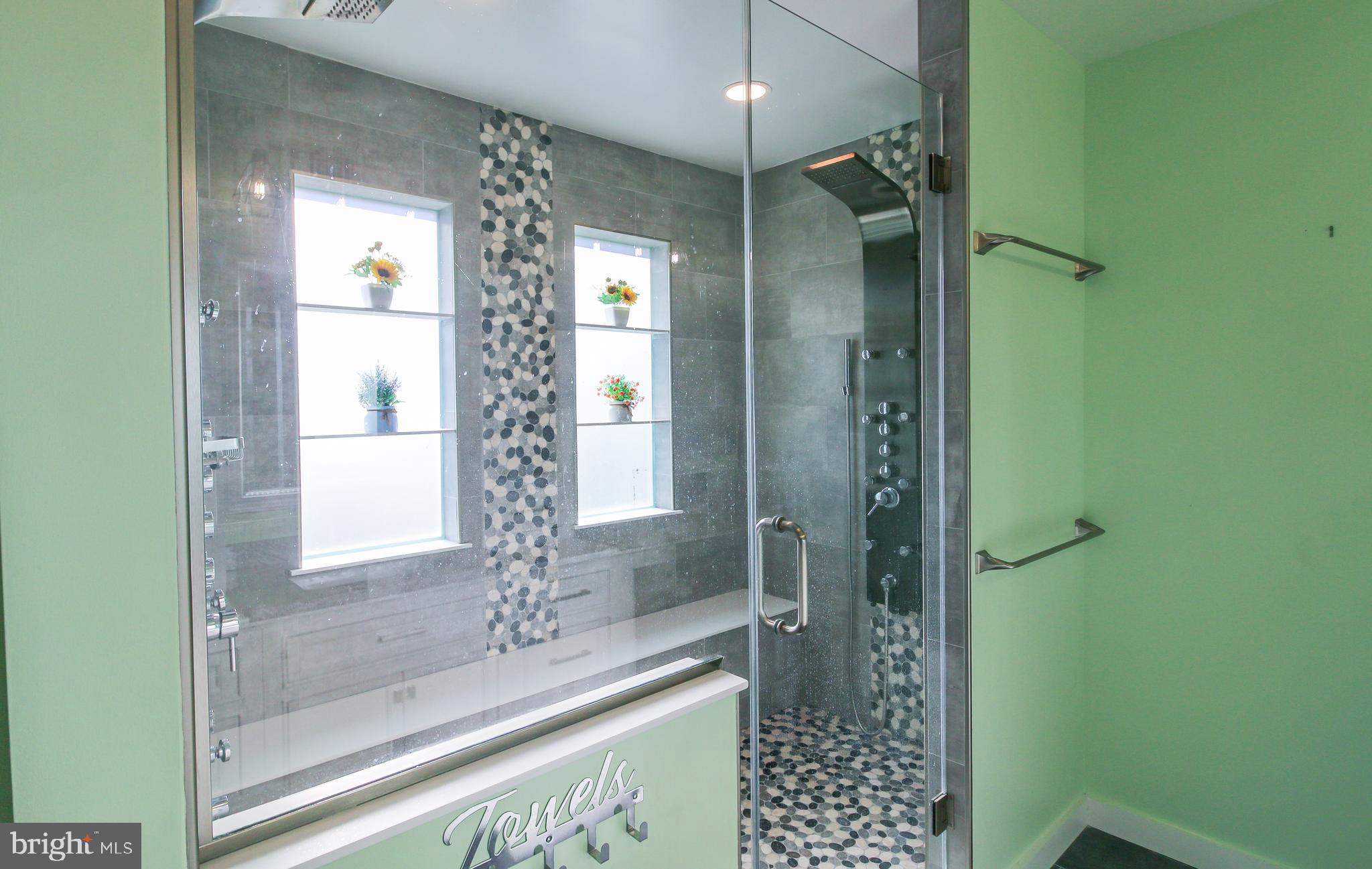 56 Cross Point Drive Owings, MD 20736 - Photo 23 of 54 a bathroom with a shower and a sink