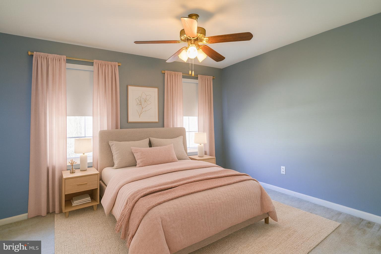 56 Cross Point Drive Owings, MD 20736 - Photo 27 of 54 a bedroom with a large bed and a chandelier