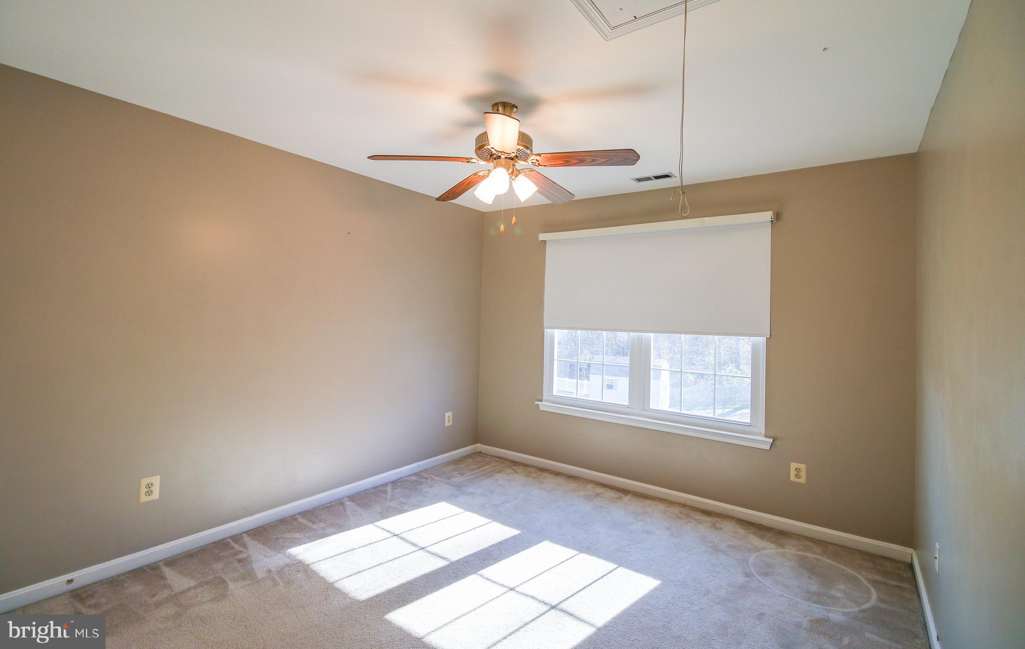 56 Cross Point Drive Owings, MD 20736 - Photo 30 of 54 a window in an empty room