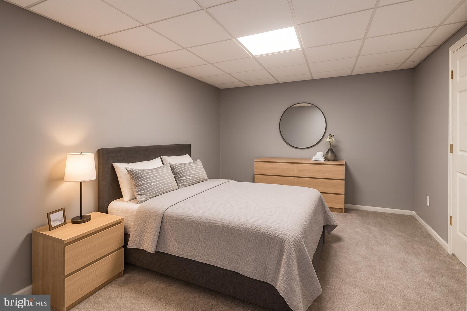 56 Cross Point Drive Owings, MD 20736 - Photo 40 of 54 a bedroom with a bed and a lamp