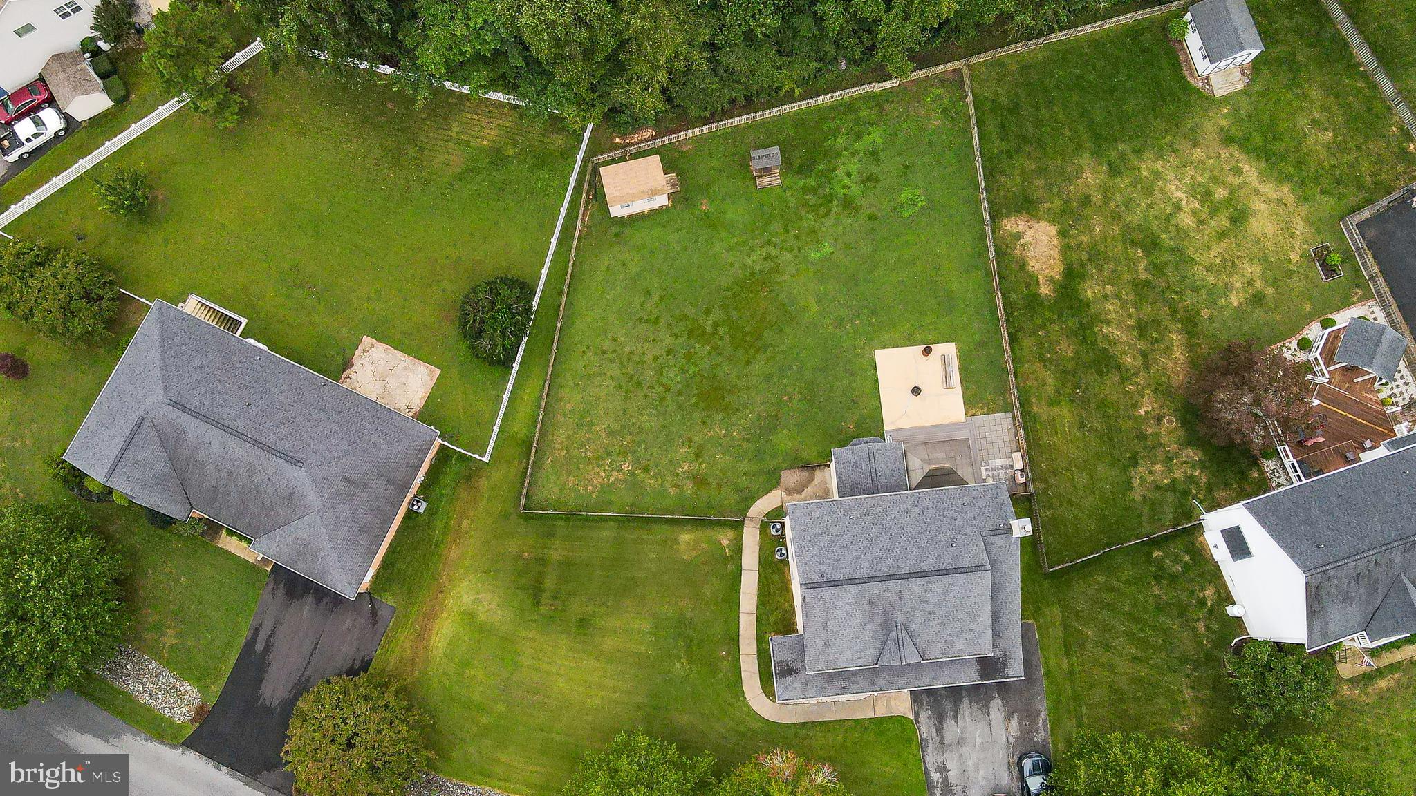 56 Cross Point Drive Owings, MD 20736 - Photo 44 of 54 an aerial view of a house with a garden and swimming pool
