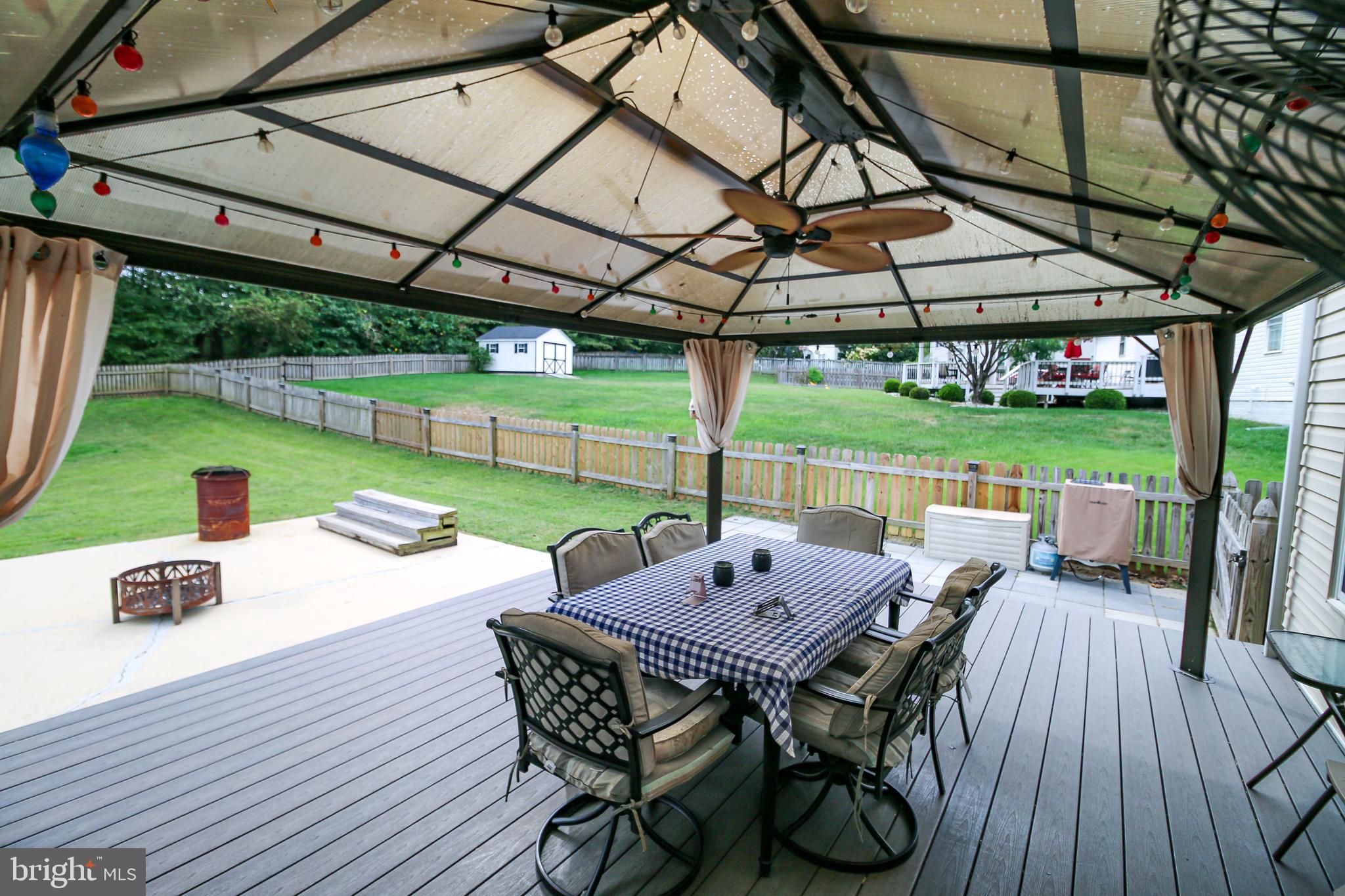 56 Cross Point Drive Owings, MD 20736 - Photo 46 of 54 a view of an outdoor sitting area with furniture