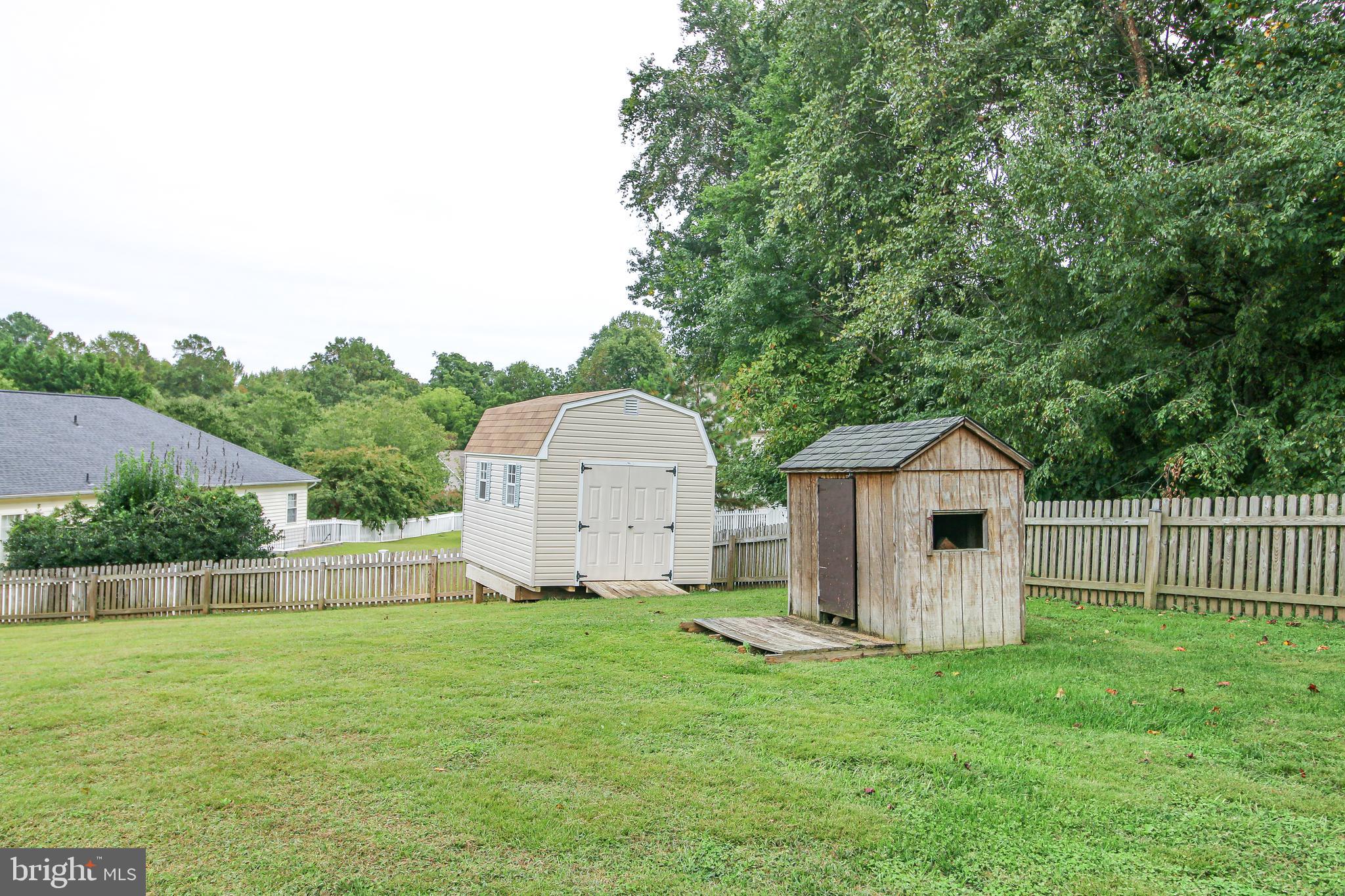 56 Cross Point Drive Owings, MD 20736 - Photo 50 of 54 a view of a house with backyard