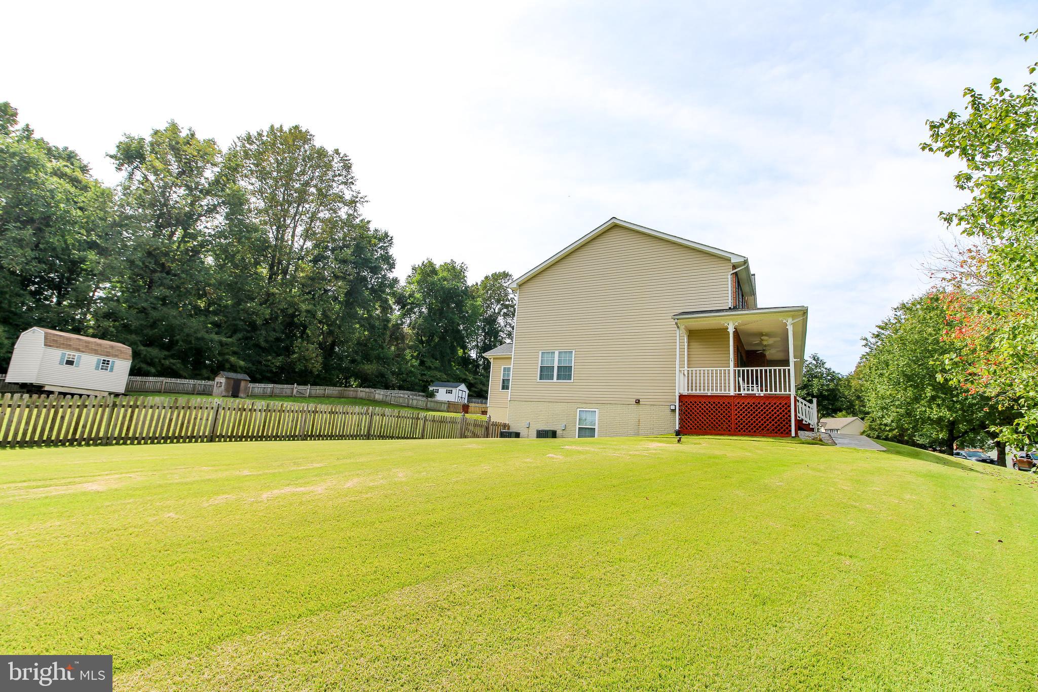 56 Cross Point Drive Owings, MD 20736 - Photo 51 of 54 a view of a house with swimming pool and yard