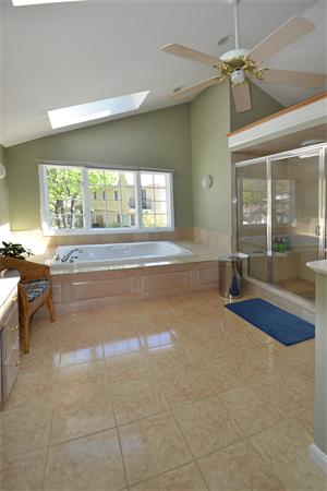 236 Parish Road Needham, MA 02494 - Photo 13 of 23 a spacious bathroom with a large tub and shower