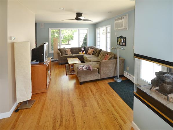 236 Parish Road Needham, MA 02494 - Photo 5 of 23 a living room with furniture and a large window